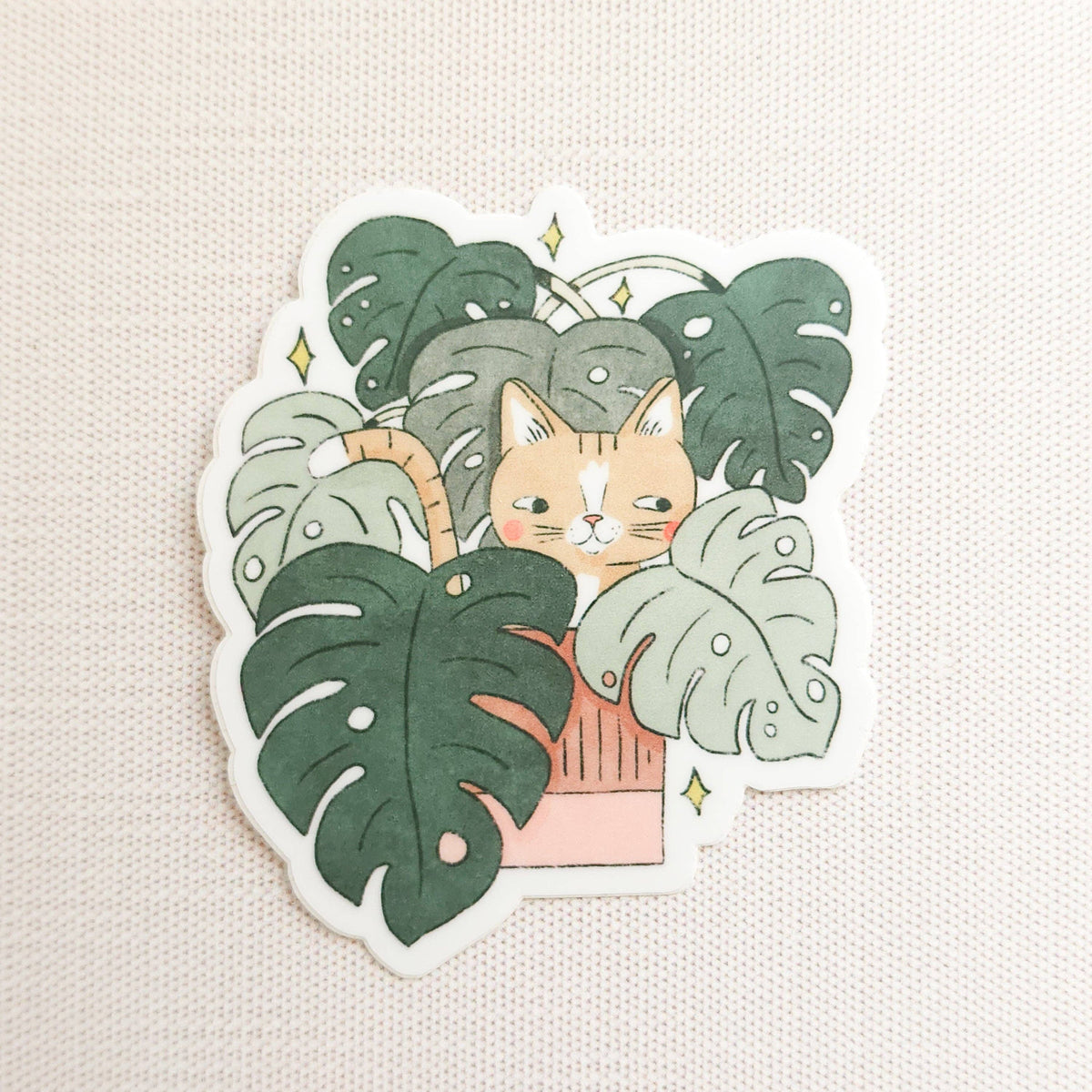 Cat in monstera vinyl sticker