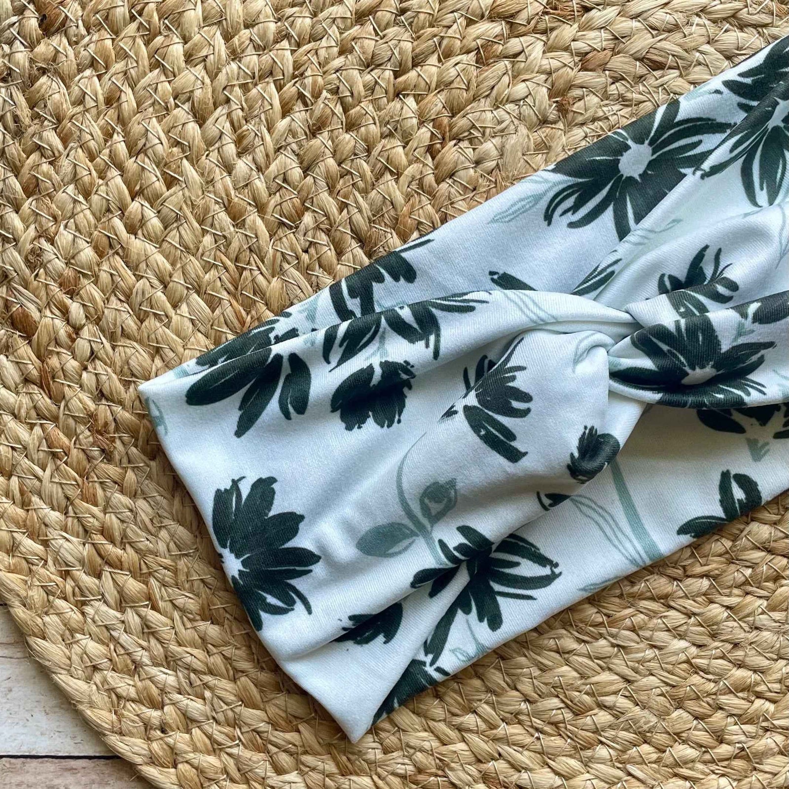 Eloquent Black and White Floral Knit Twist Headband