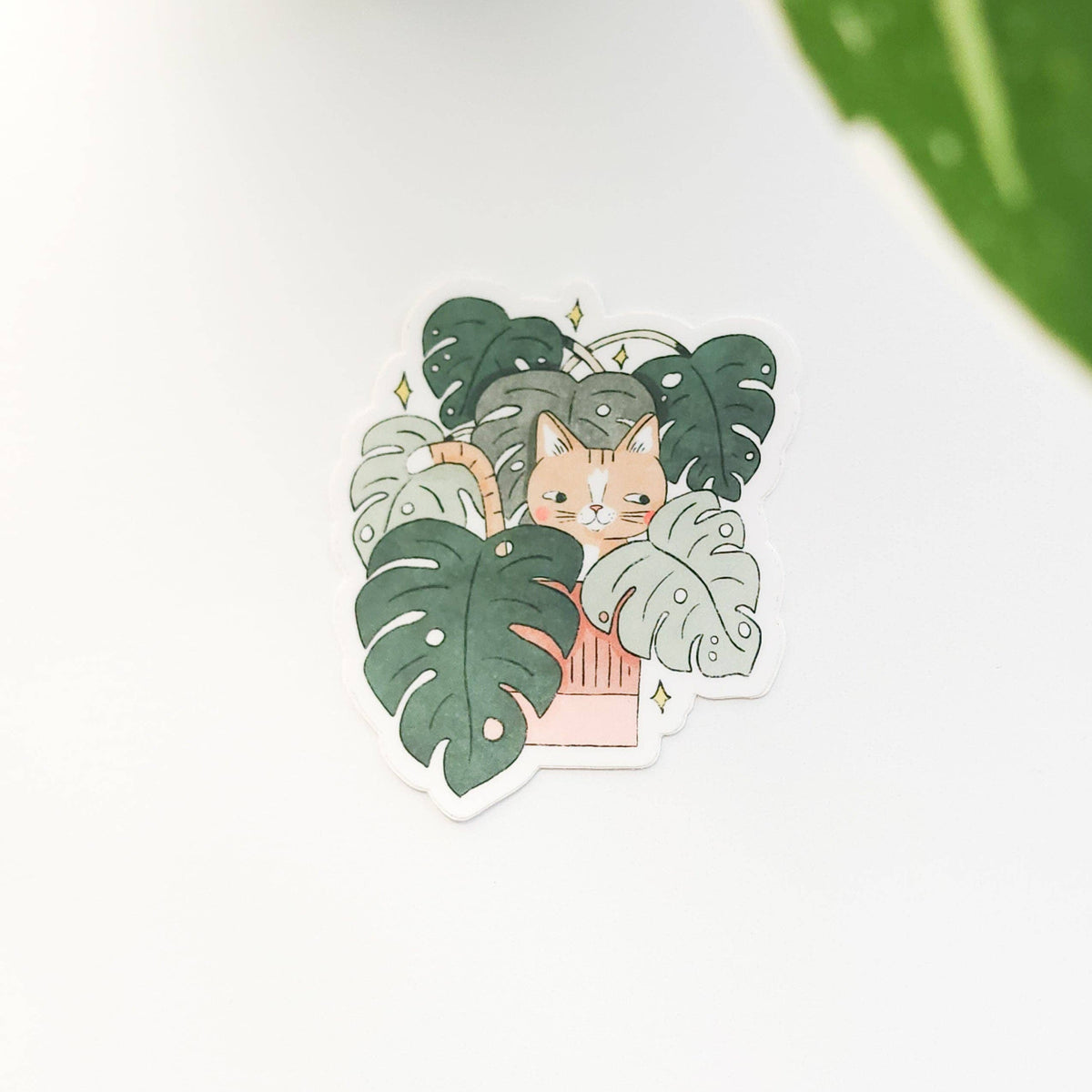 Cat in monstera vinyl sticker