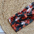 Petals on Black Knit Twist Headband