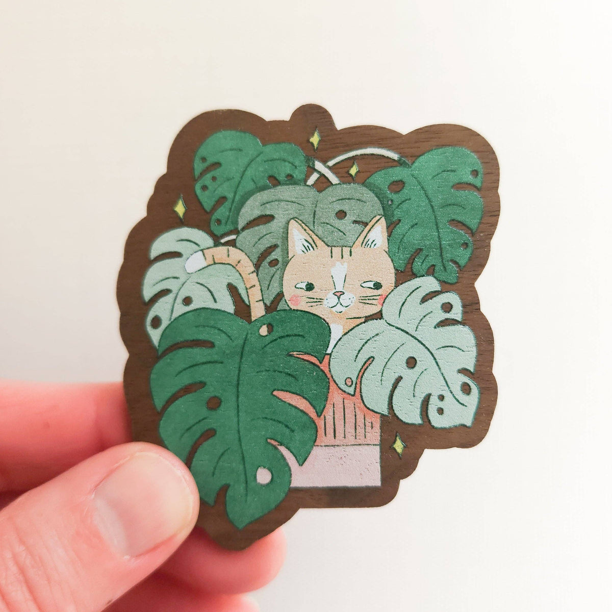 Cat in monstera refrigerator magnet