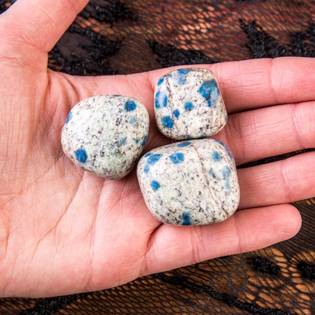 Jumbo K2 Jasper Tumbled Stones in someone&#39;s hand