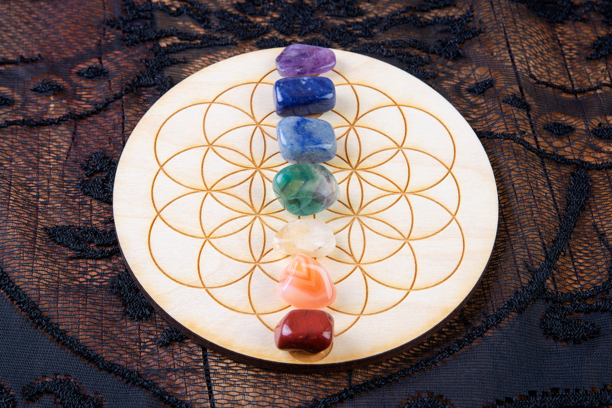 Chakra Crystal Grid Board with rainbow crystals assembled on it